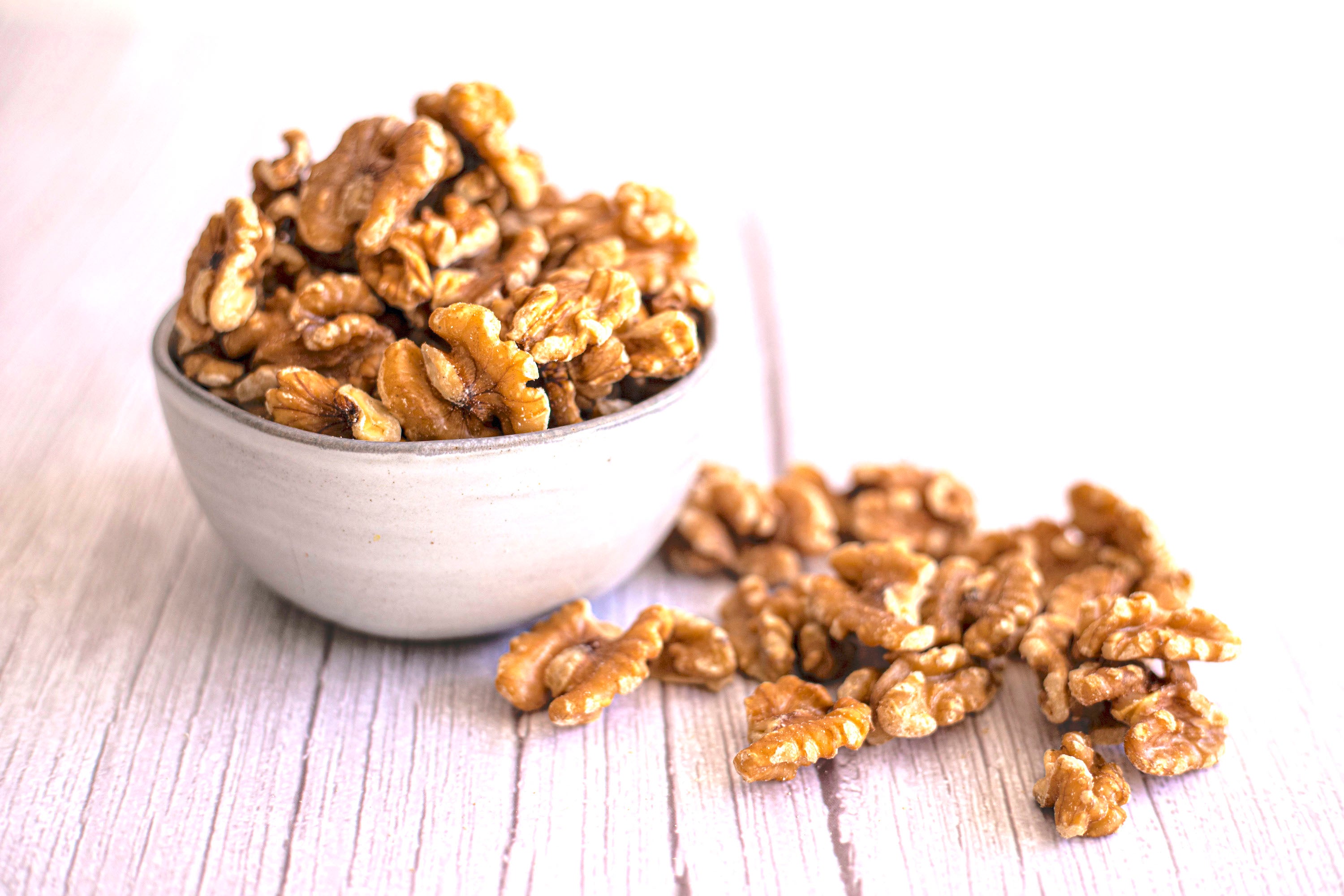 Organic Chandler walnuts on a dish